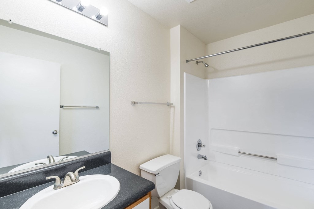 a bathroom with a sink and a toilet and a shower at Crescent Pointe, Stafford, VA