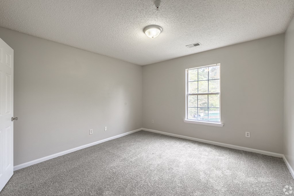 Bedroom With Plenty Of Natural Lights at Cross Creek Apartments, Beaufort, SC