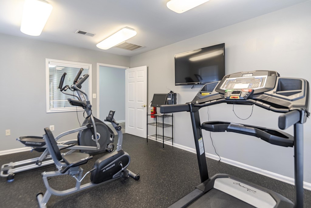 A room with a treadmill and a stationary bike at English Oaks Apartments, Fredericksburg, VA, 22406