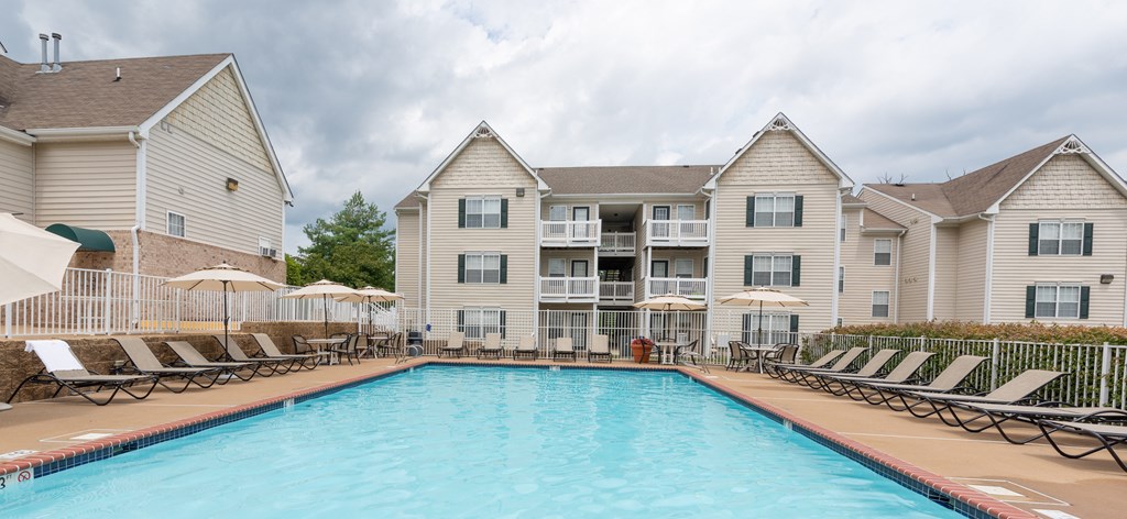 A large swimming pool in front of apartment buildings.at Summerland Heights, Woodbridge Virginia  