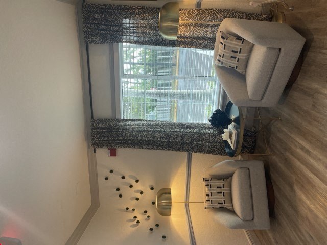 a bathroom with a sink and a window