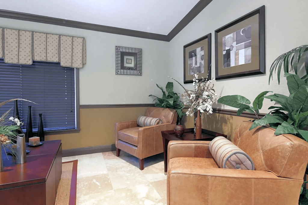 a living room with two couches and a table