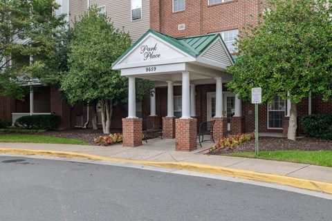 A building with a sign that says Park Place 9659.