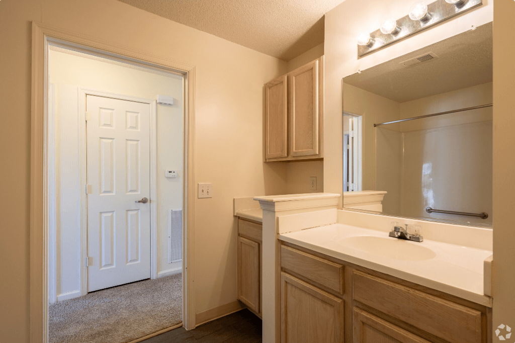 the preserve at ballantyne commons apartments bathroom with sink and mirror