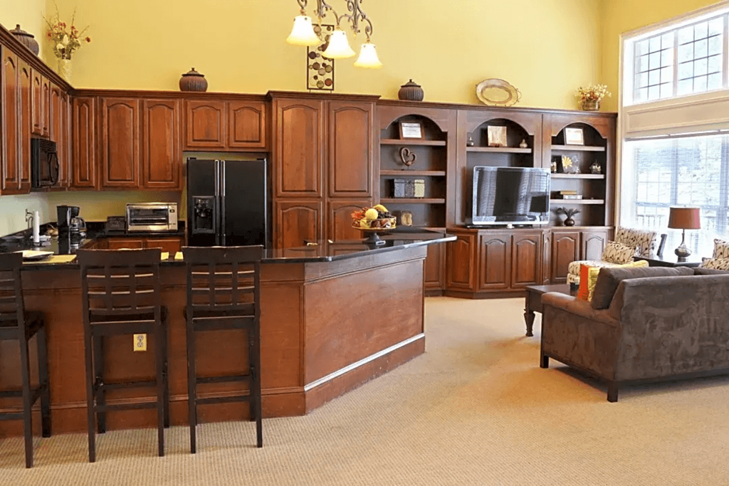 a kitchen with wooden cabinets and a counter top