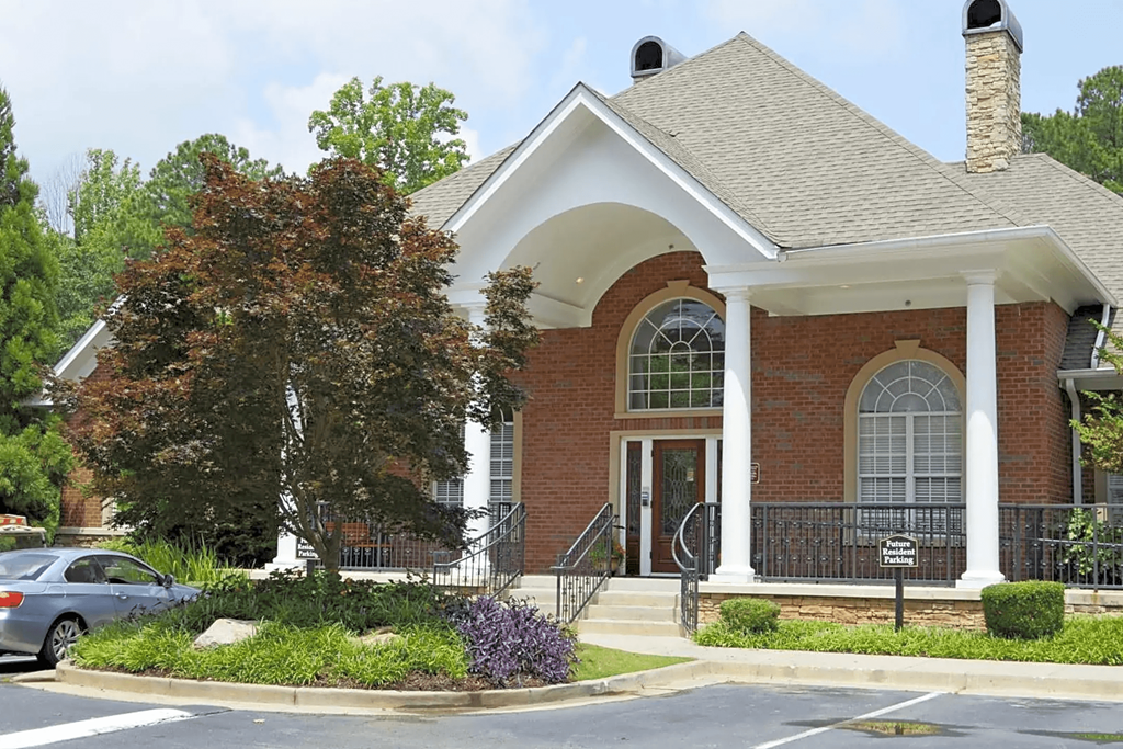 a house with a car parked in front of it