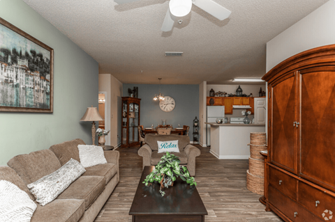 a living room with a couch and a coffee table