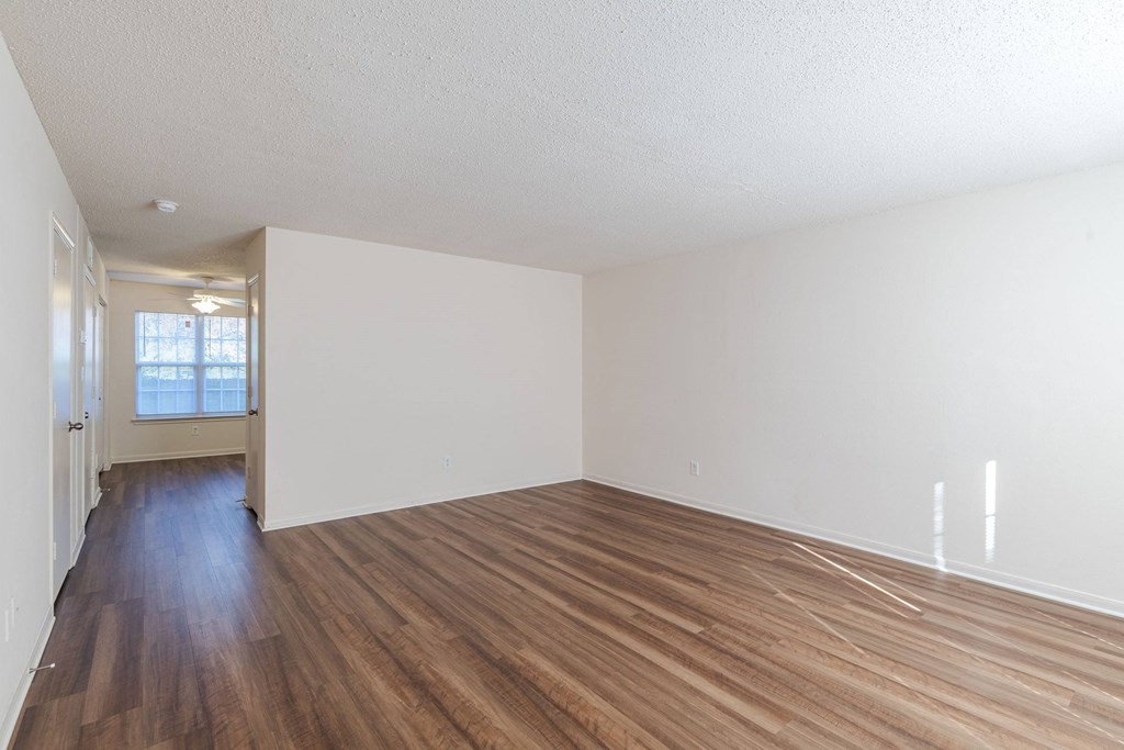A room with wooden floors and white walls.at The Village at England Run, 22406  