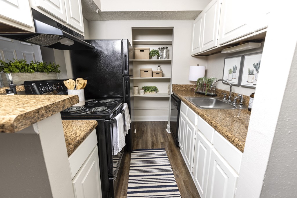 Modern Kitchen With Stainless Steel Appliances And Double Door Refrigerators at Dwell at Greenridge, North Charleston, SC, South Carolina