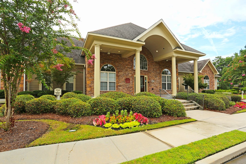 a house with a sidewalk in front of it