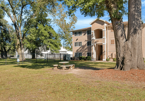 our apartments have a spacious yard with a picnic table