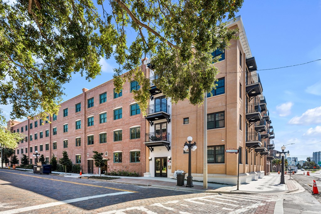 a large brick building on the corner of a city street at Casa Marti, Tampa, Florida