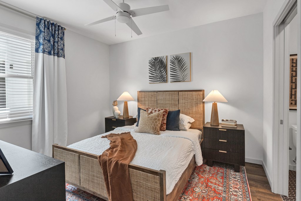 a bedroom with a bed and a ceiling fan at Casa Marti, 33605