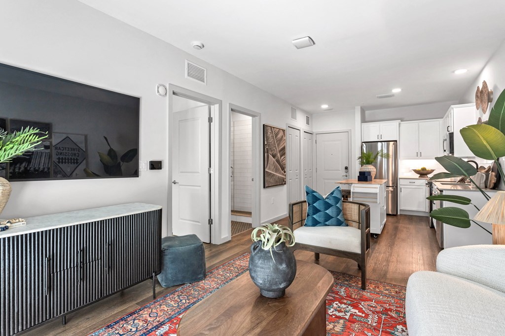 a living room with a couch and a chair and a table at Casa Marti, Tampa, Florida, 33605