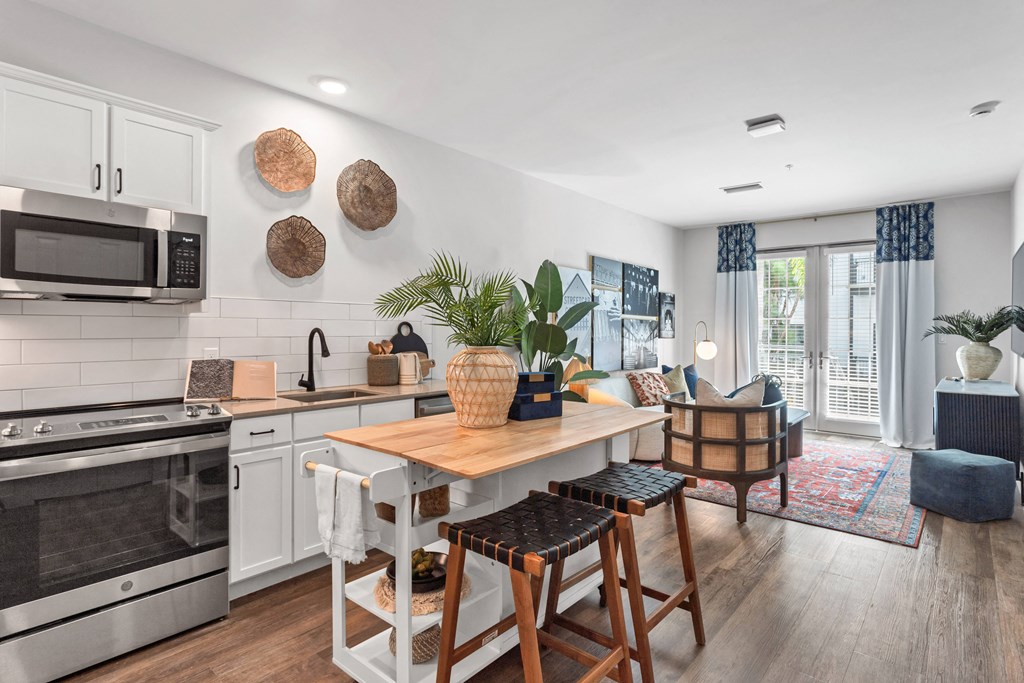 an open kitchen and living room with a dining room table at Casa Marti, Tampa, 33605