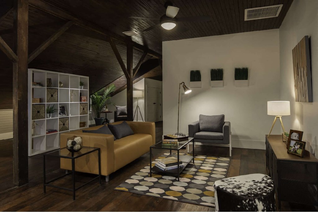 a living room with a couch and a table