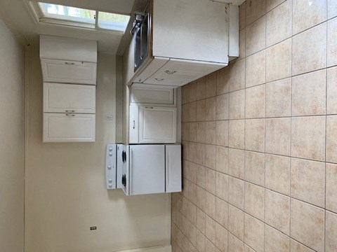 a kitchen tile floors and stove at Hurd & Bone Property Management, Lebanon