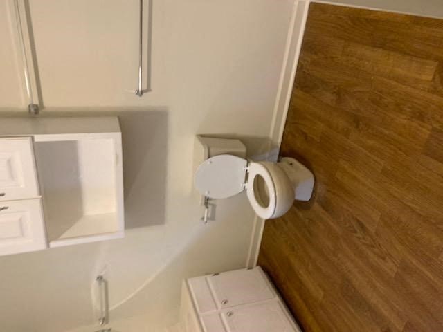 a bathroom with metal fixtures at Hurd & Bone Property Management, Lebanon