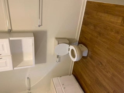 a bathroom with metal fixtures at Hurd & Bone Property Management, Lebanon