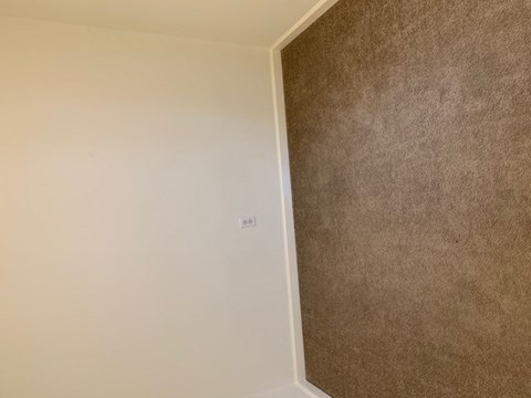 a bedroom with white walls and carpet at Hurd & Bone Property Management, Lebanon, TN