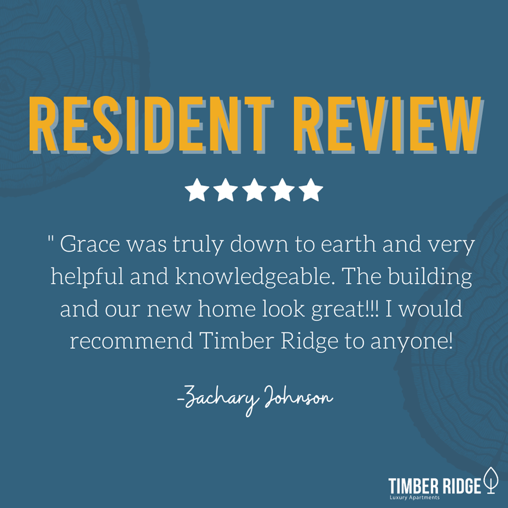 A resident review for Timber Ridge Apartments featuring a five-star rating and a positive testimonial from Zachary Johnson.
