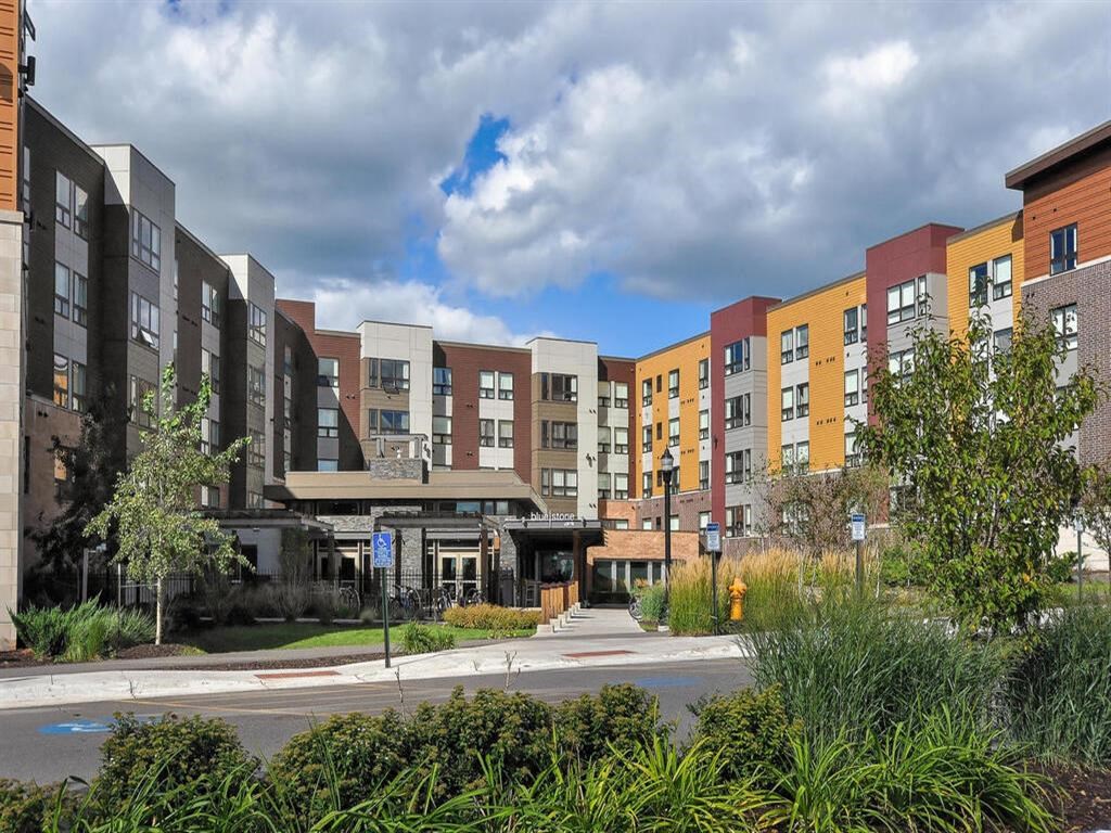 a row of new apartment buildings on a city street at Bluestone Lofts, Duluth, MN 55803