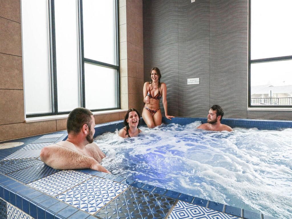 a group of people in a jacuzzi at Bluestone Lofts, Minnesota