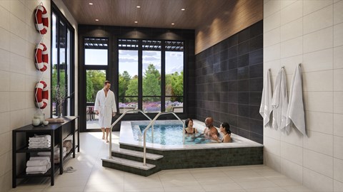 Indoor hot tub spa with scenic outdoor views at The Villas at Sand Lake Resort Apartments, Sturgeon Lake