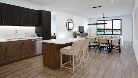 A modern kitchen with dark wood cabinets and a white countertop.
