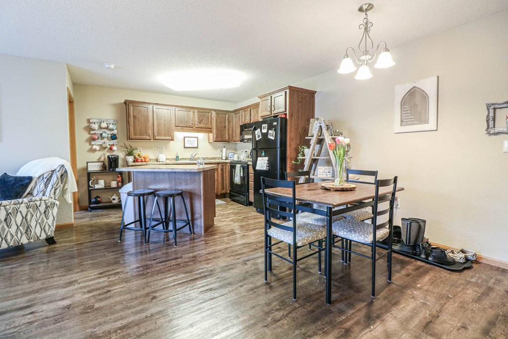 a kitchen and dining room with a table and chairs at Boulder Ridge, Duluth
