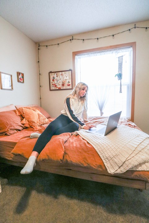 Woman Working On A Laptop at Summit Ridge, Duluth, Minnesota