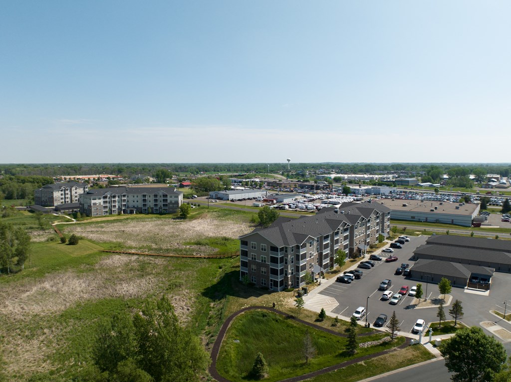 an aerial view of an apartment complex in a city  at Timber Ridge, Forest Lake, MN