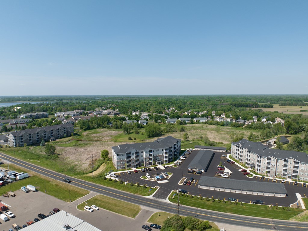 an aerial view of a city with buildings and roads  at Timber Ridge, Minnesota, 55025