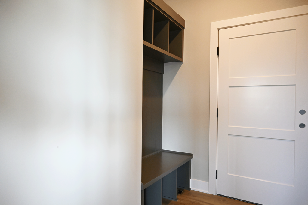 A white door is on the right side of the image.