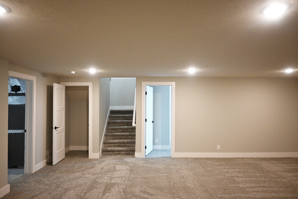A room with a staircase leading to the second floor.