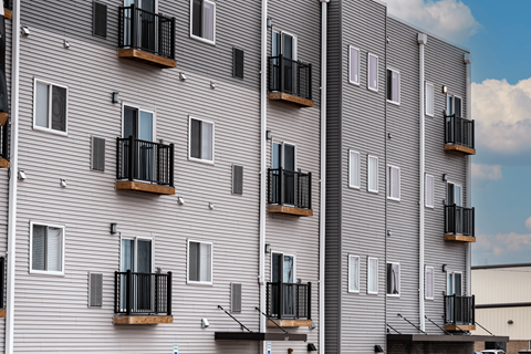 A building with balconies and windows.