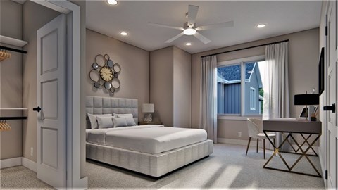 A bedroom with a large bed, a ceiling fan, and a window with curtains.