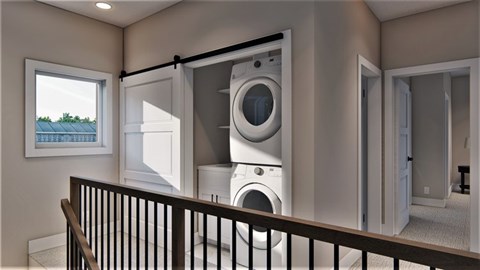 A washing machine is installed in a laundry room.