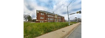 Exterior view of the apartment building for the 2 Bed 1 Bath at Rosewater Apartments.