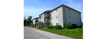 Exterior view of the apartment building for the 2 Bed 2 Bath at Huntington Apartments.
