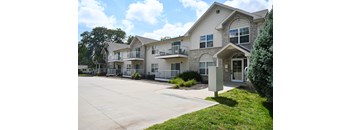 Exterior view of a multi unit residential building for the 1 Bed 1 Bath at Square 131 - 4880 - 12 Plex.