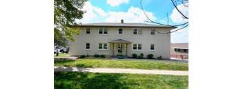 Exterior view of a multi unit residential building for the 2 Bed 1 Bath at Square 131 - 4860 - 5 Plex.