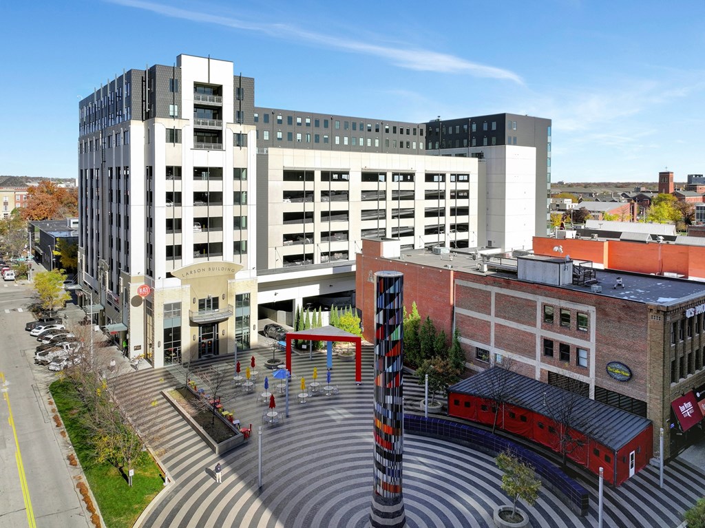 an aerial view of a city street with buildings and a fountain at Parkhaus Apartments, Lincoln