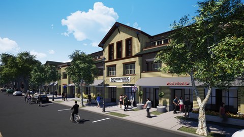 A street view of a city with a building that has a sign that says "MOORPARK".