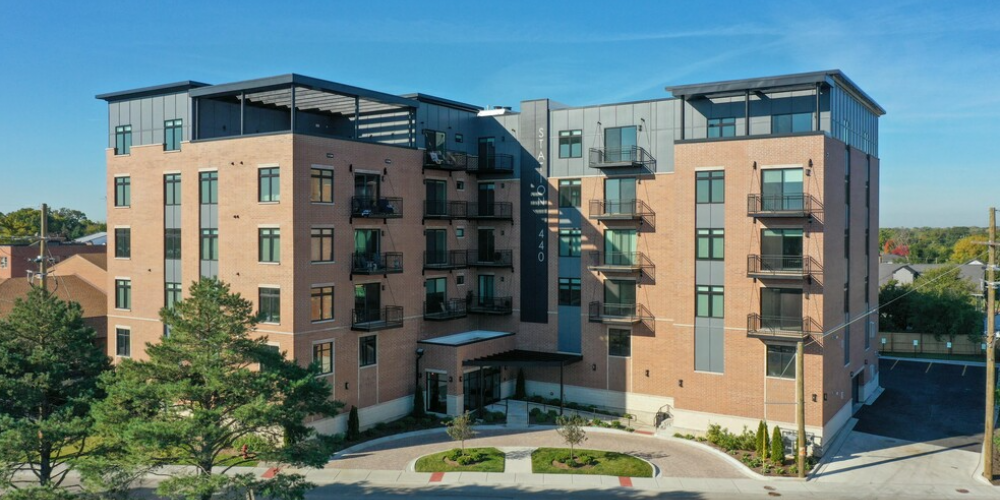 an aerial view of an apartment building on a sunny day at Highwood 440, Illinois