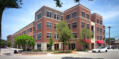 a large brick building on the corner of a street at Clarendon Hills 229, Clarendon, 60514