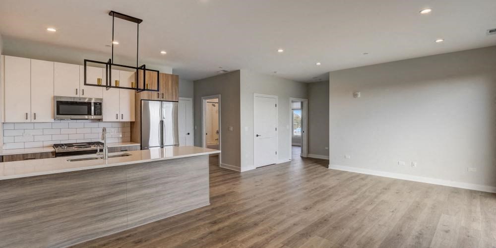 a kitchen with a counter top and a refrigerator at Highwood 440, Highwood, 60515