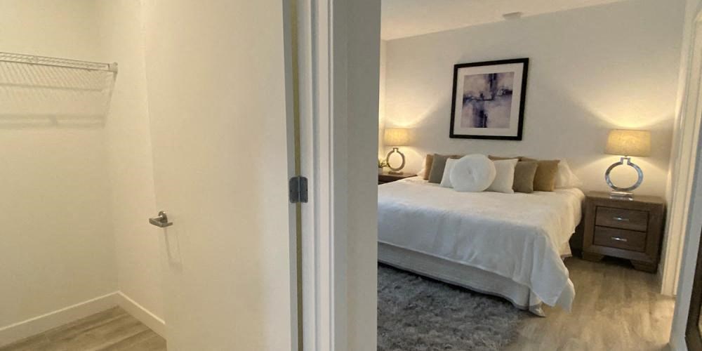 a bedroom with a bed and a closet at Highwood 546, Illinois