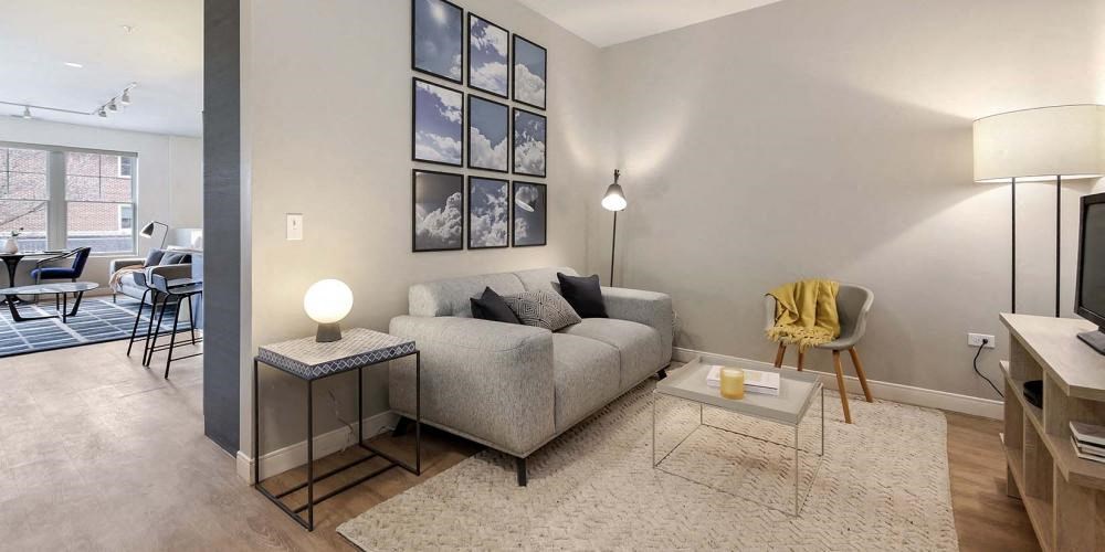 a living room with a couch and a table at Clarendon Hills 229, Illinois