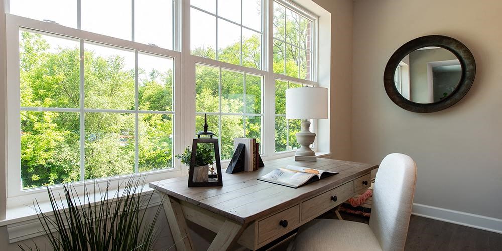 a room with a desk and a large window at Countryside Townhomes, Countryside, IL 60525